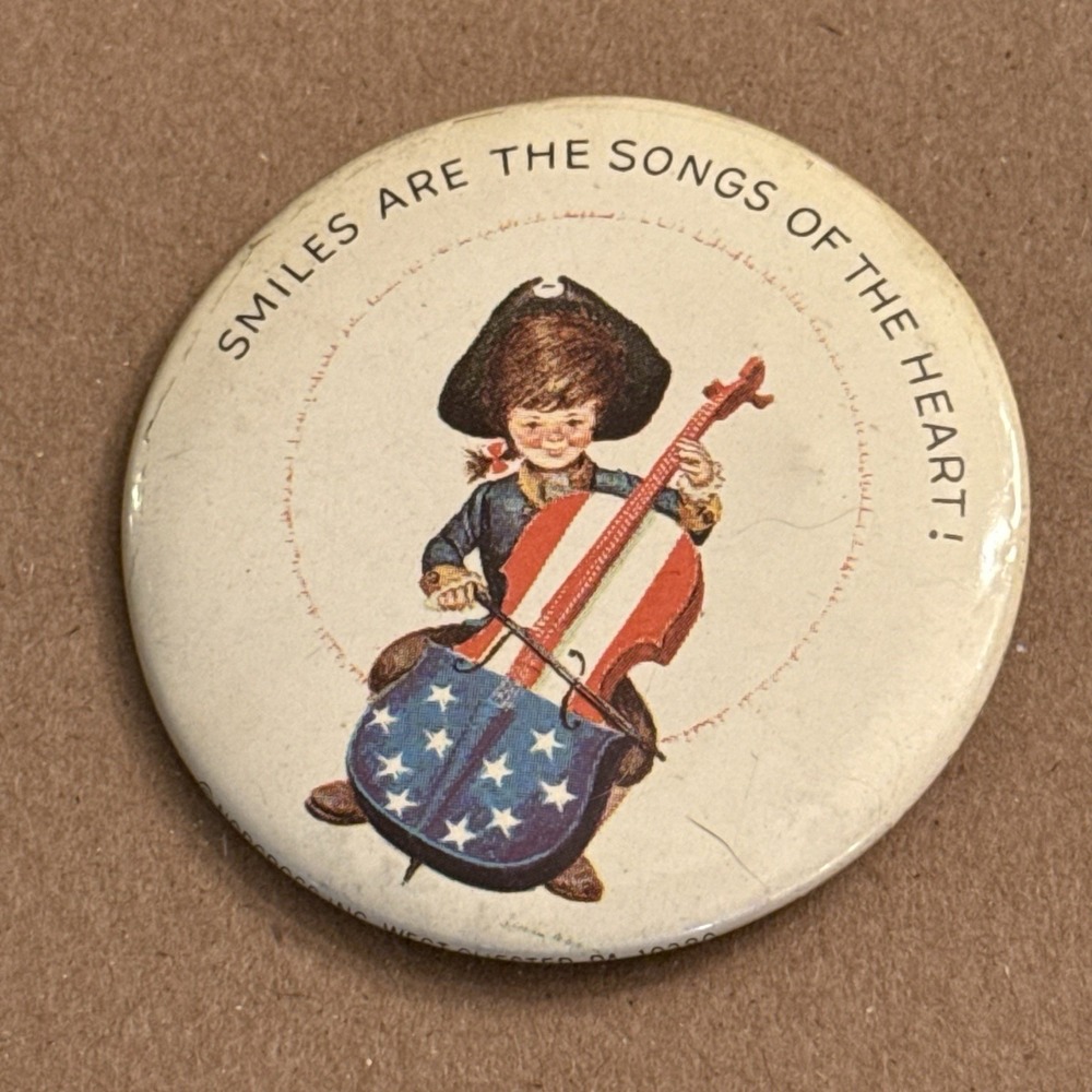 Smiles Are The Songs Of The Heart USA Flag Cello Pinback Button Pin Round Circle